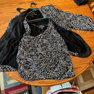 Out fit for wedding or anything nice. Got at Von Maur size 2xl